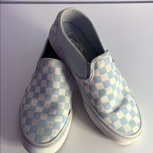 Baby blue checkered slip on Vans.